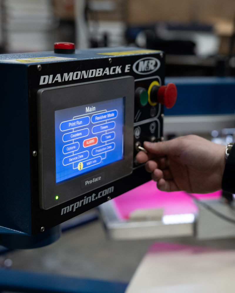 M&R Diamondback screen printing press control panel at Blink Threads